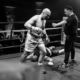 Boxer stands over knocked-out opponent as referee intervenes at Rocky’s Gala, Leicester, March 2025